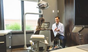 Dr Logan Smith with patient